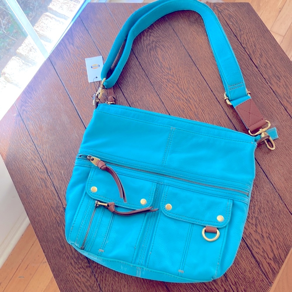 New with tags blue leather crossbody bag with adjustable strap